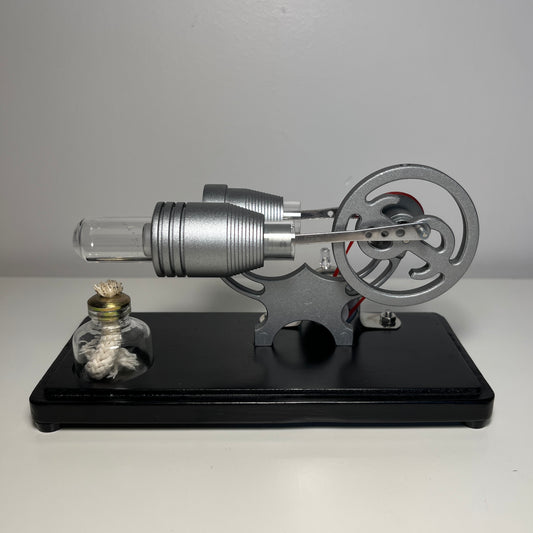 Stirling engine with power generator and LED