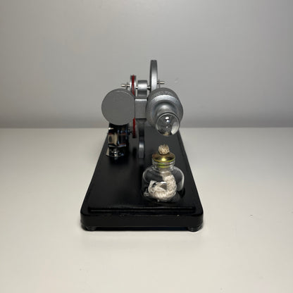 Stirling engine with power generator and LED